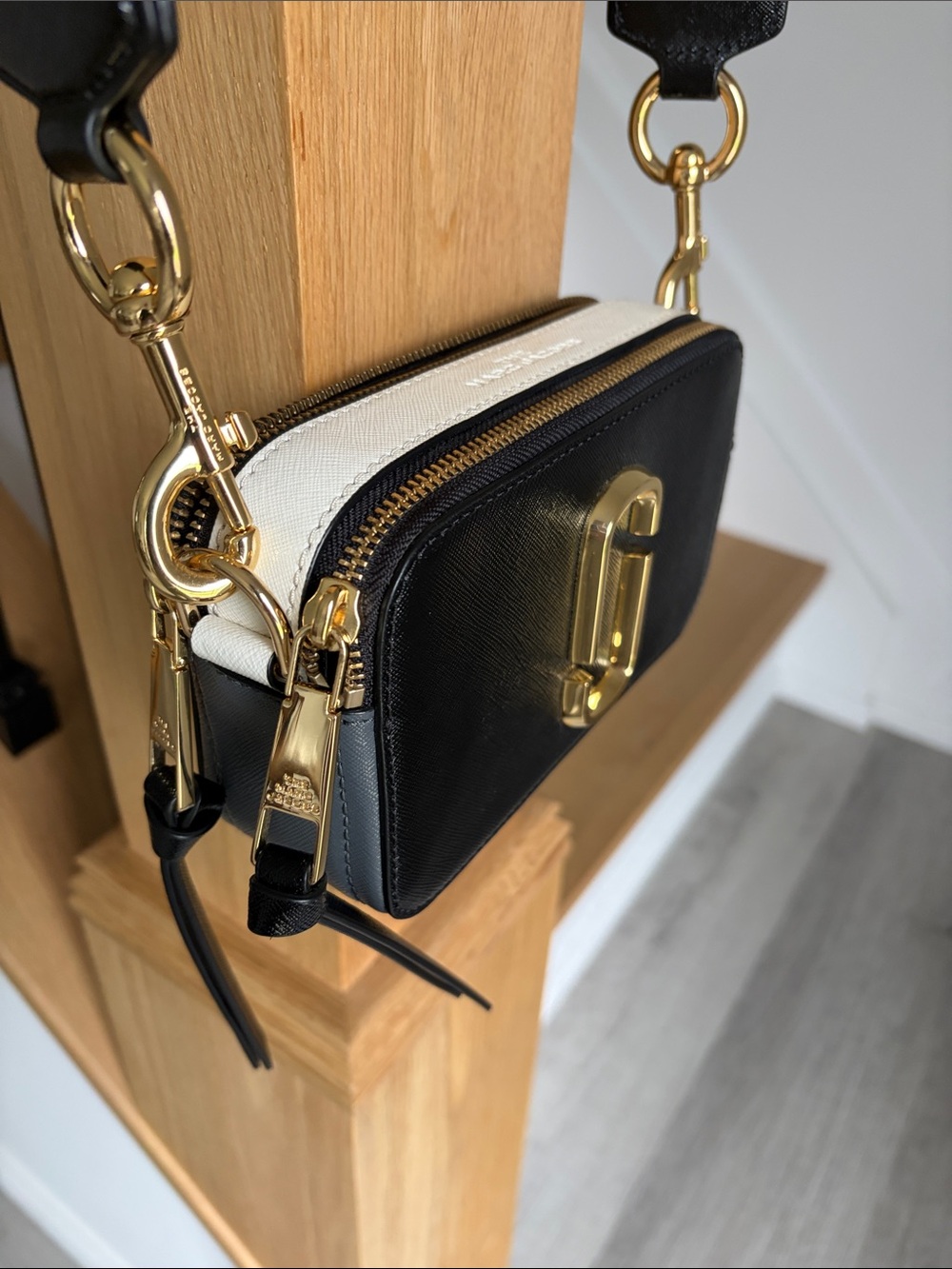 Marc Jacobs Black Crossbody Camera Bag with Gold Hardware and Branded Strap